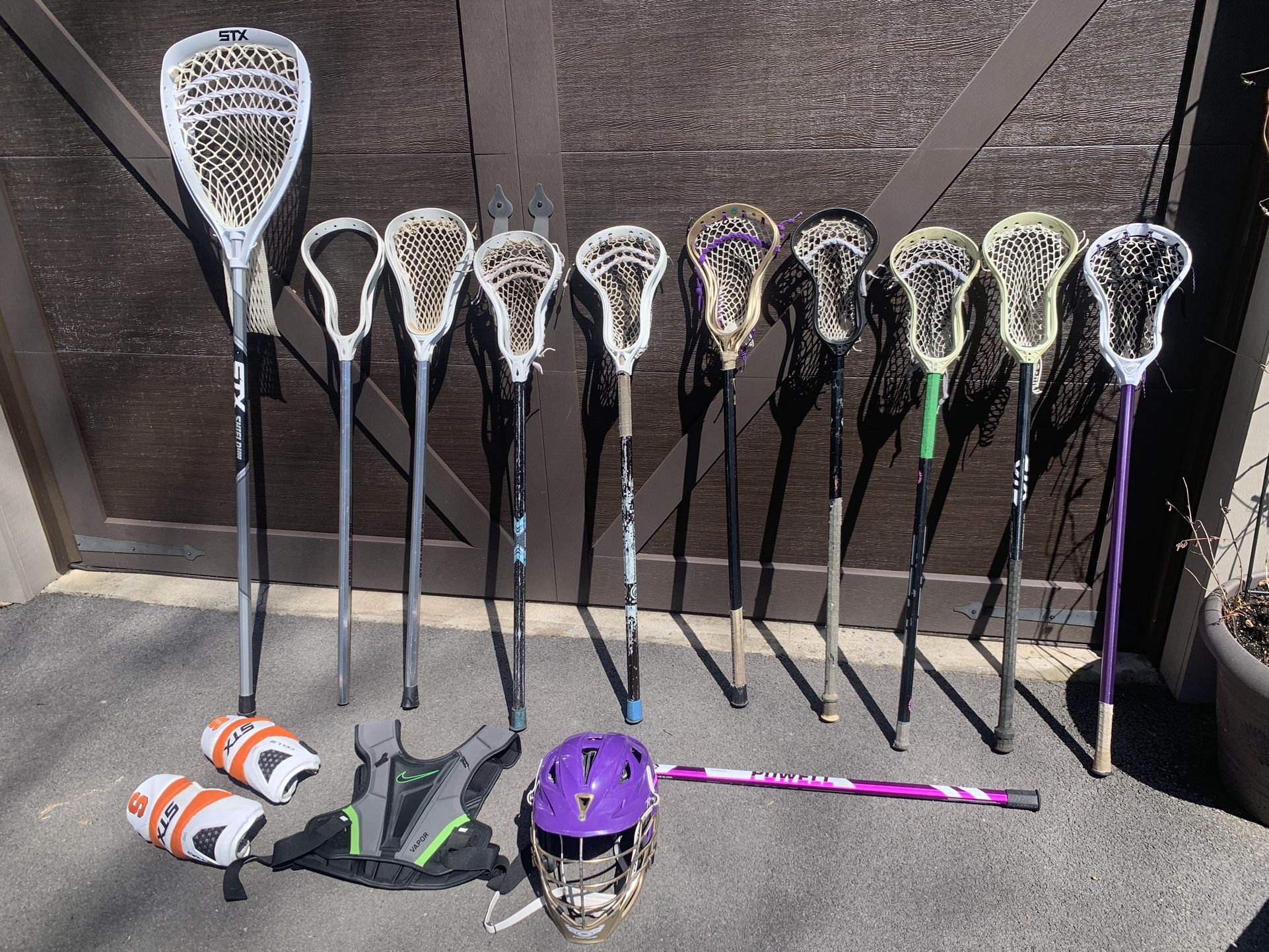 Huge Lacrosse Gear Lot - 10 Sticks, Pads, Helmet, Goalie Gear-350