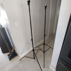 Two Tripods with carry Case and extra pieces looks like everything is there not sure
