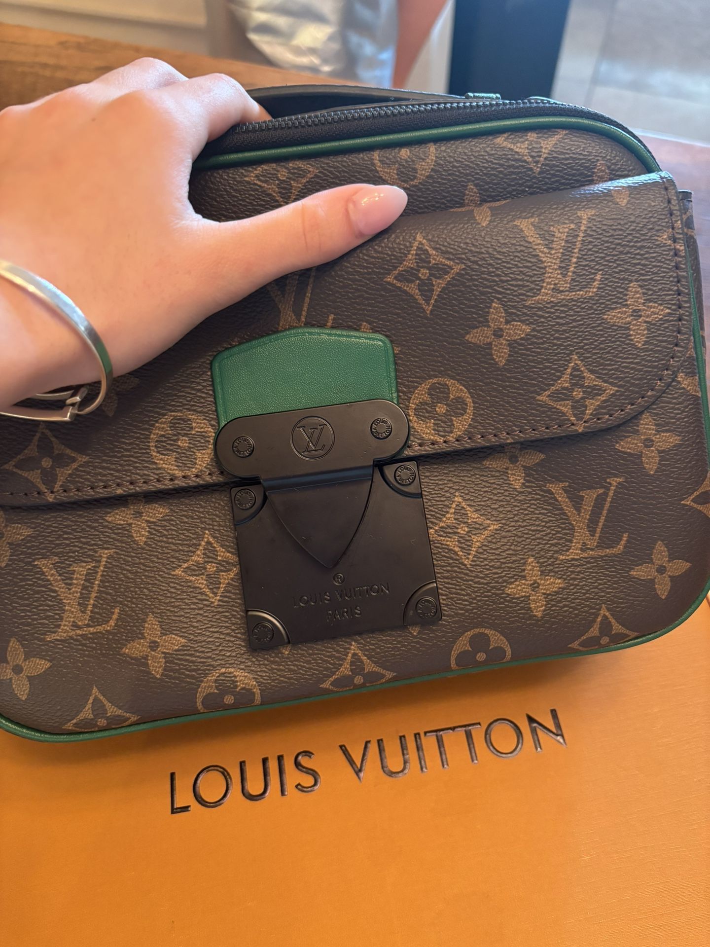 Louis Vuitton S Lock Messenger bag