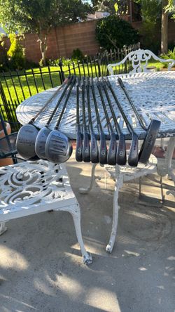 11 golf clubs, 7 irons by pro staff Wilson , 3 woods by warriors  no.s 3 ,5. 1 driver no. 12, pinsseker.1 putter by file golf .