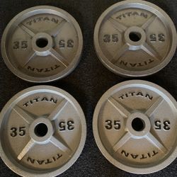 Titan Fitness (four) 35lb Single Cast Iron Plates