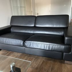 Leather Sofa With Folding Headrests 