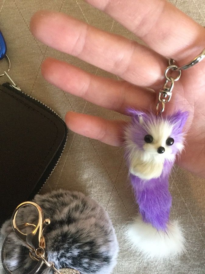 Assorted. nice Keychains 🔑 Purple Foxy keychain $12 / Soft fur ball with feather keychain $12 / Leather wallet keychain $20 😁👍🔑