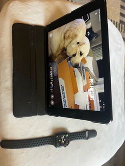 iPad 2 64GB with stand and a series 4 44mm Apple Watch