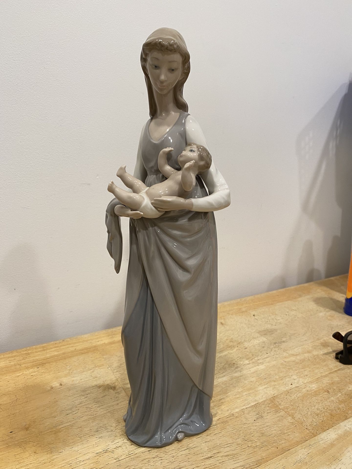 Lladro Women Holding A Baby