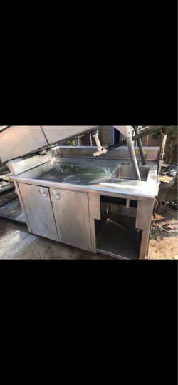 Stainless steel cabinet with one hand sink