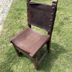 Antique Spanish revival monk’s chair
