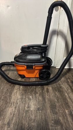 Rigid portable vacuum