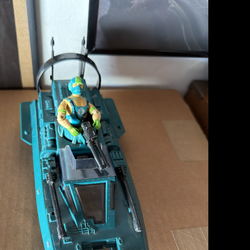 1984 G.I. Joe Cobra Water Moccasin vehicle with its pilot, Copperhead