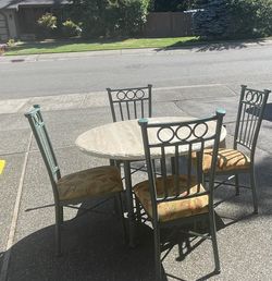 Round 45” Diameter Kitchen Table And 4 Chairs.