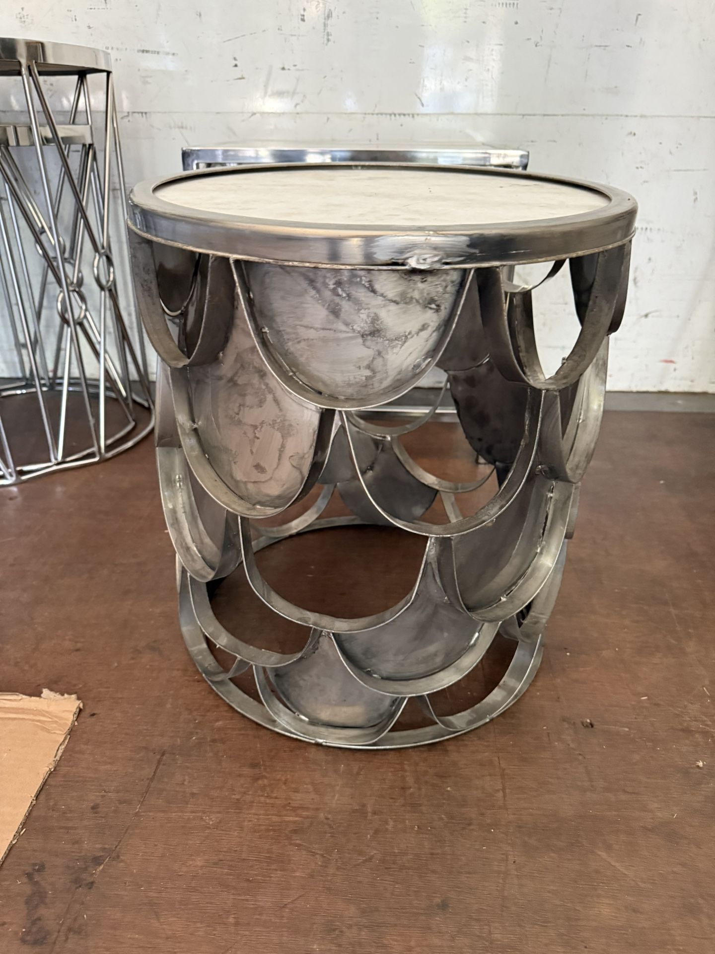 Adorable White/Gray Marble And Scalloped Brush Metal Table