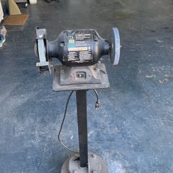 Bench grinder with stand
