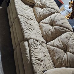beige couch, vibrating couch / recliner seats
