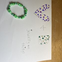 Black, White, And Green Bracelets 
