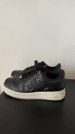 Nike Air Force 1 ’07 LX “Mini Swoosh” in Black/Metallic Gold