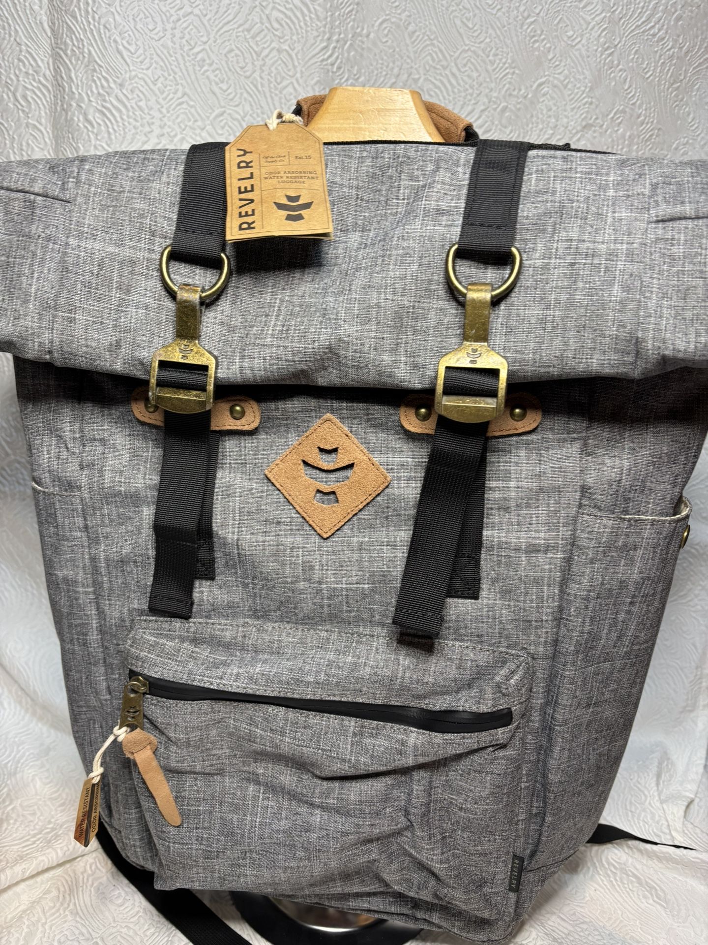 Revelry Top roll Backpack 
