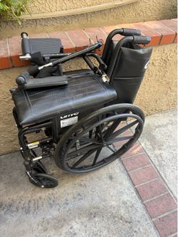 Folding wheel chair