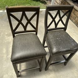 2 leather wooden bar stool chairs with foot rests