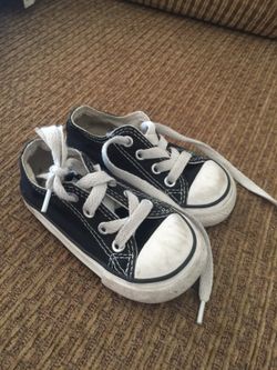 Converse black low top