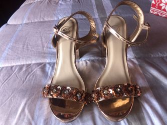 Gold shiny high heels