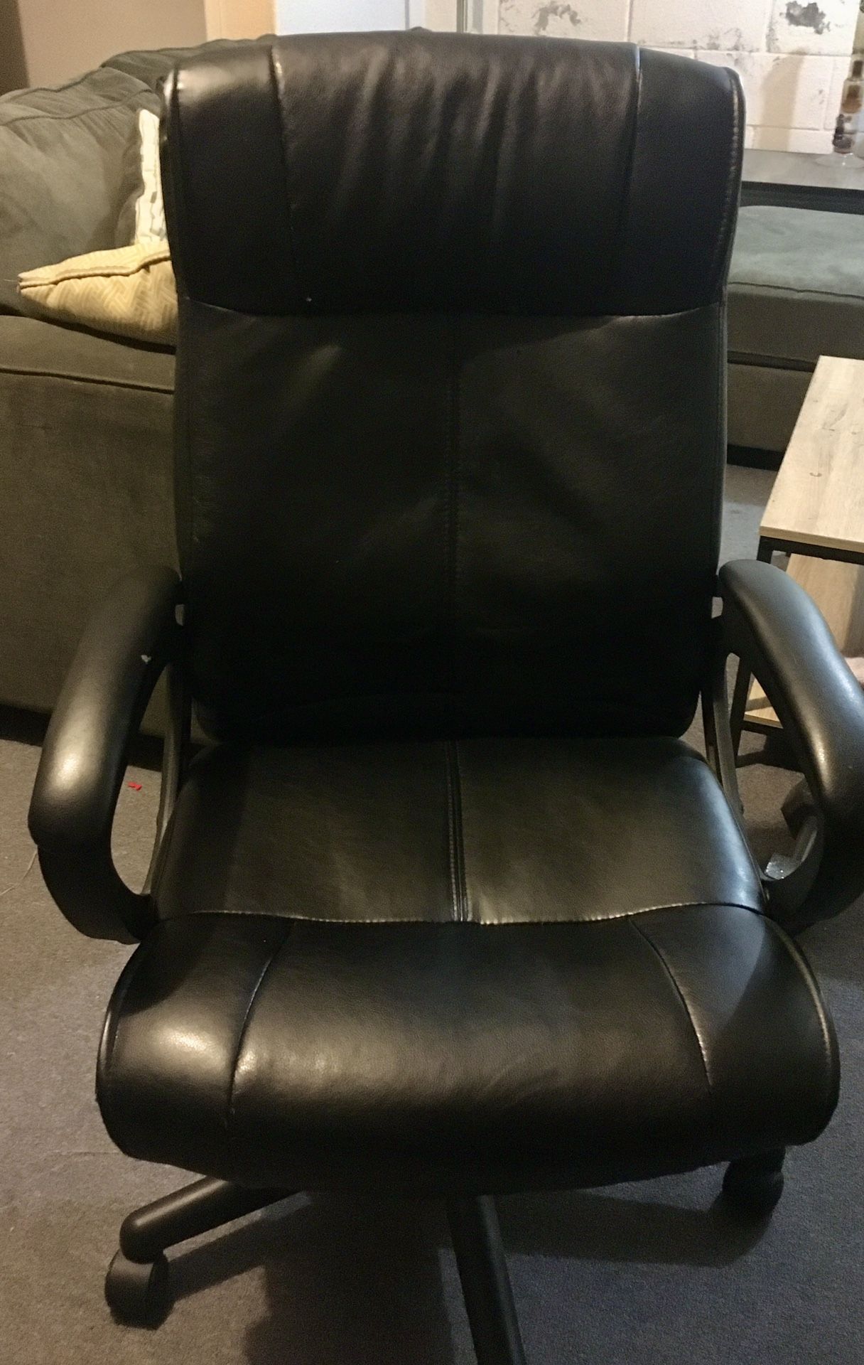 Adjustable black leather desk chair