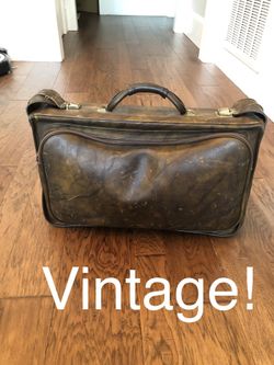 Vintage suitcase. All buckles and zippers work great. No rips, tears, etc. Great for photo prop, etc.
