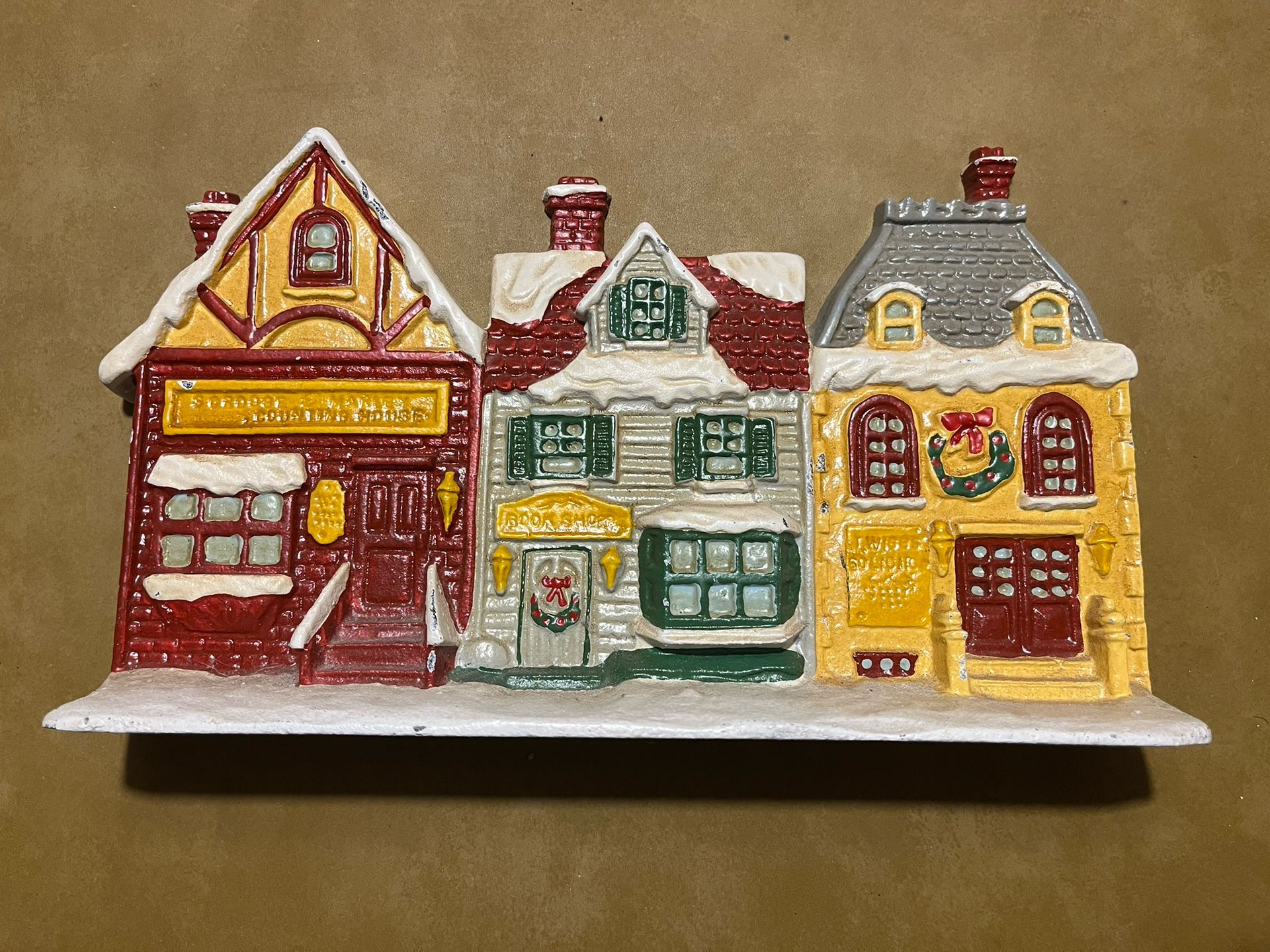 Antique Cast Iron Christmas Town Door Stop