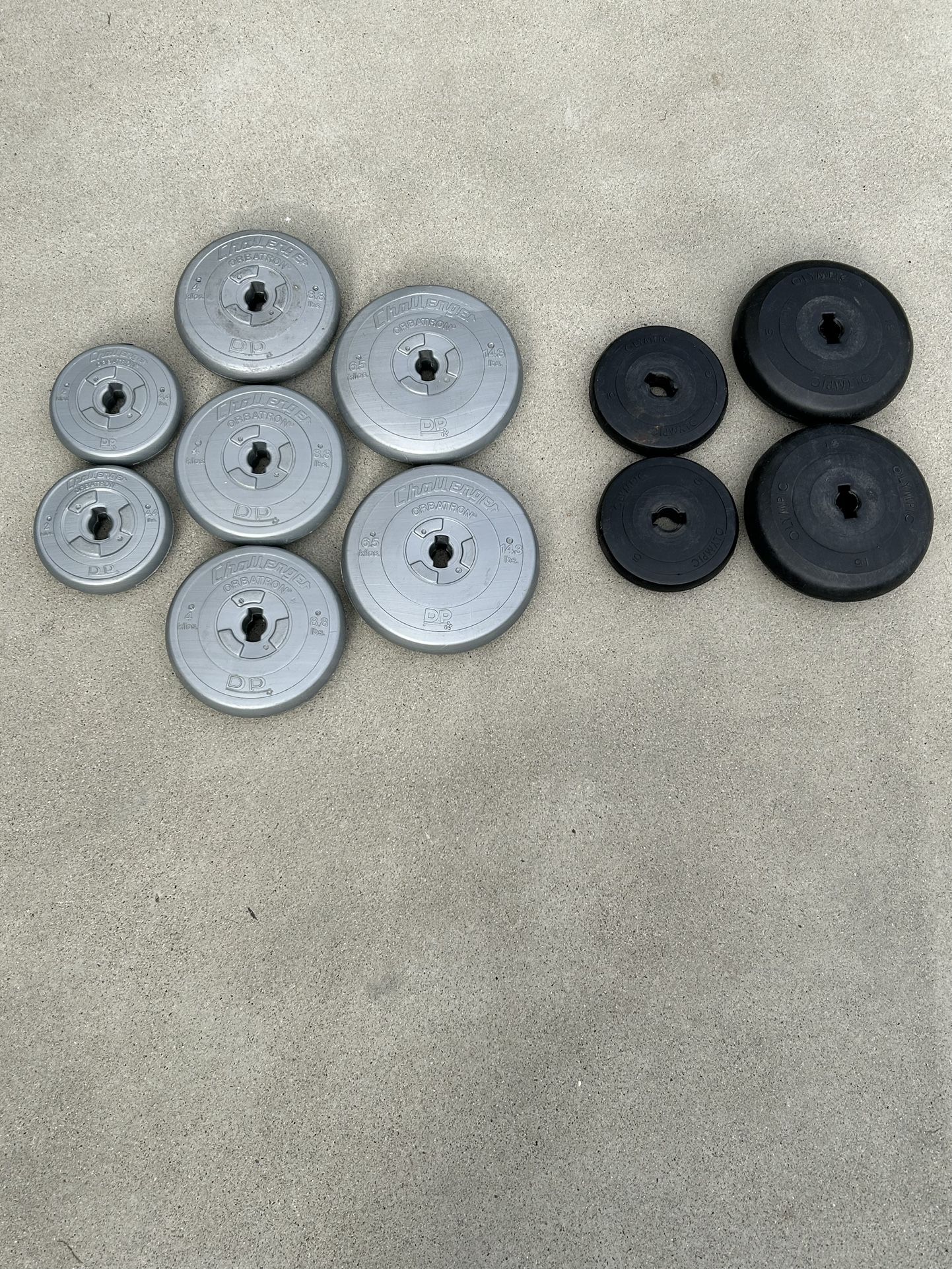 Olympic/Challenger Weight Lifting Plates/Dumbbells/Barbells