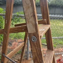 vintage wooden Dixie Special step ladder features a functional utility shelf and was manufactured by the Florida Ladder Co. 