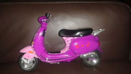 Barbie doll scooter