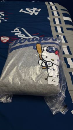 Hello kitty sweater gave out by dodgers