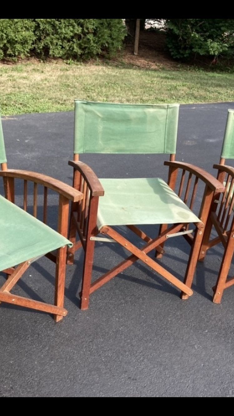 Three green directors chairs 