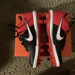 Nike cleats new in box size 5 1/2 red black