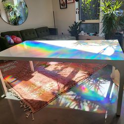 White dining table (seats up to 8)