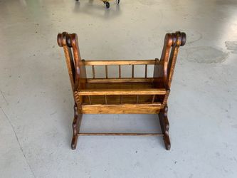 Wooden swinging baby doll bassinet