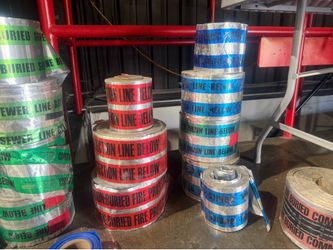 Detectable underground marking tape