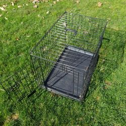 Medium size dog cage 19" by 30" by by 22"