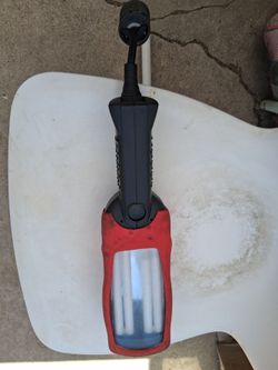 Matco fluorecent with outlet work lamp