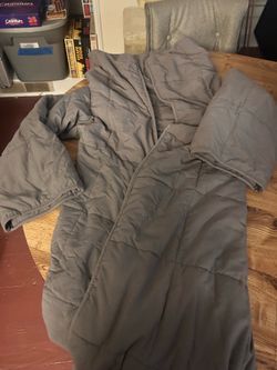 Gray weighted blanket with sleeves