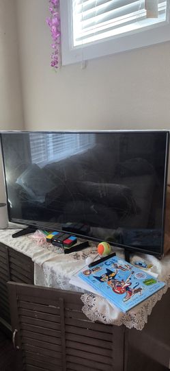 Toshiba 43" TV comes with TV stand.
