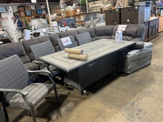 Outdoor patio table with fire pit and 4 wicked chairs