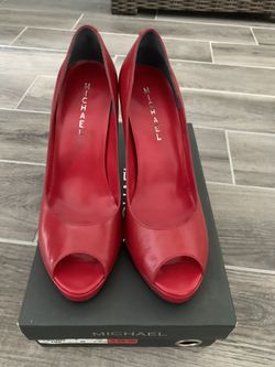 Women’s red peep toe pumps - size 9