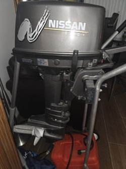 Nissan  Outbord  Motor 2004 with  3 gallon Tank,etc