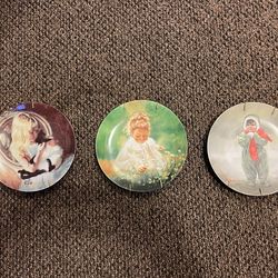 9 Donald Zolan collector plates
