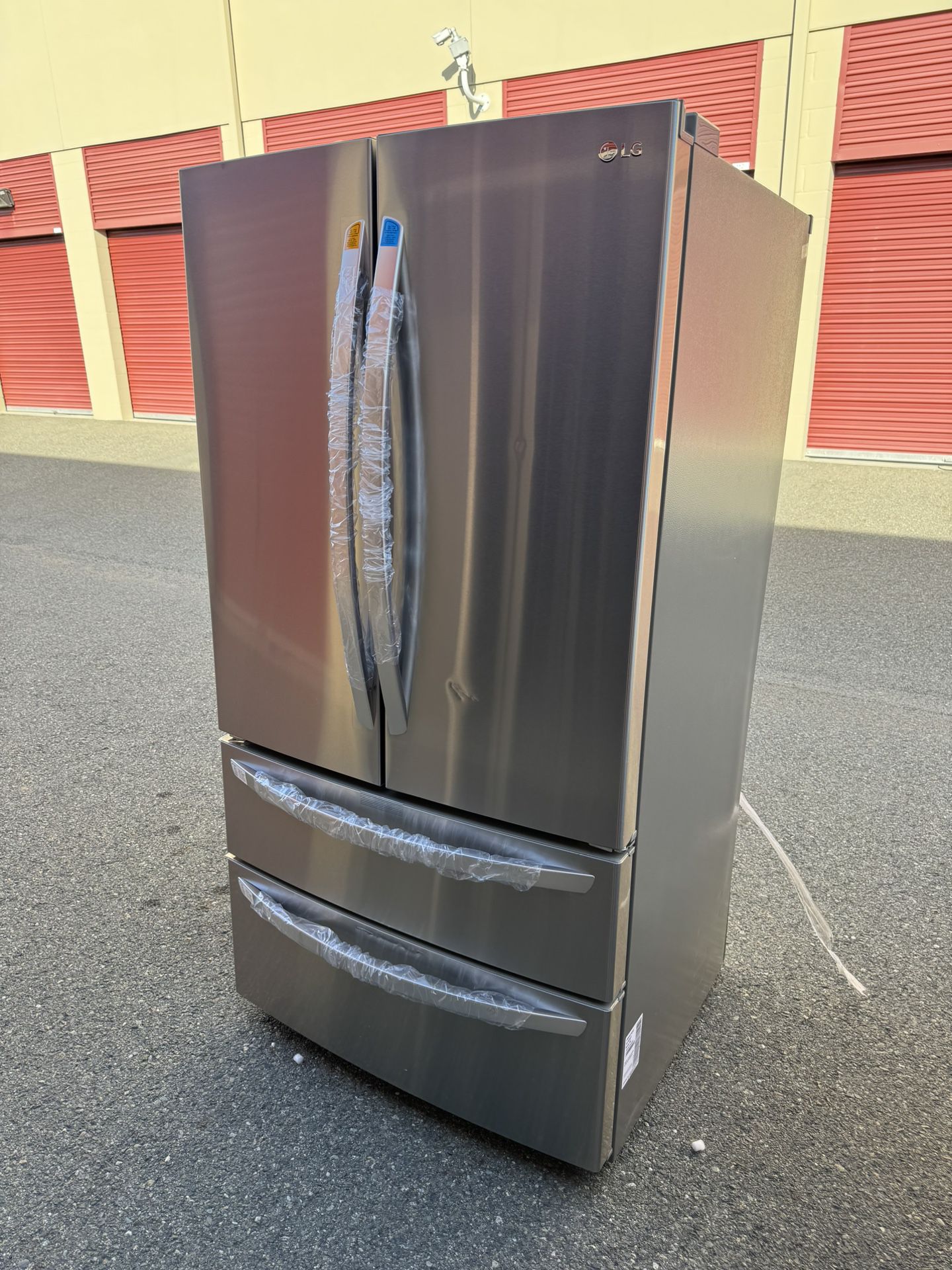 Brand New French Door LG Refrigerator With A Double Freezer 