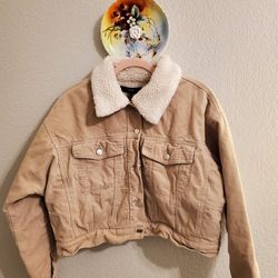 Forever 21: A tan/white corduroy jacket with a cropped fit.