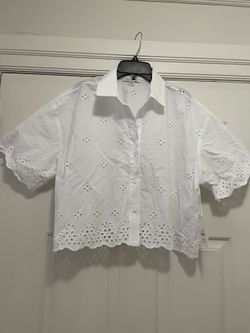 Brand new adorable women’s size large white blouse. Never worn