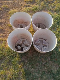 Four large planters plastic good shape 75th Ave Indian School serious buyers only please