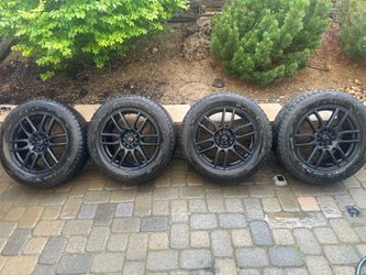 Bridgestone Blizzak 235 60 R18  tires with Raceline Tuning wheels