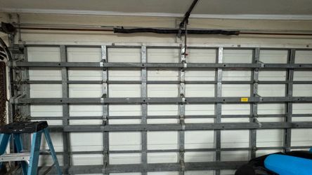 Garage Door Spring Opener Off Track Adjustment Replace And Parts